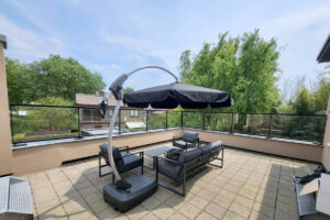 Voordelen van een glazen balustrade op een dakterras